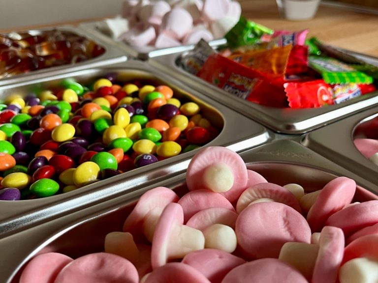 A selection of sweets (pick and mix) inside the Le Petit Chariot luxury grazing cart A selection of pick and mix sweets arranged on the Le Petit Chariot luxury grazing cart, ready for a wedding or party.